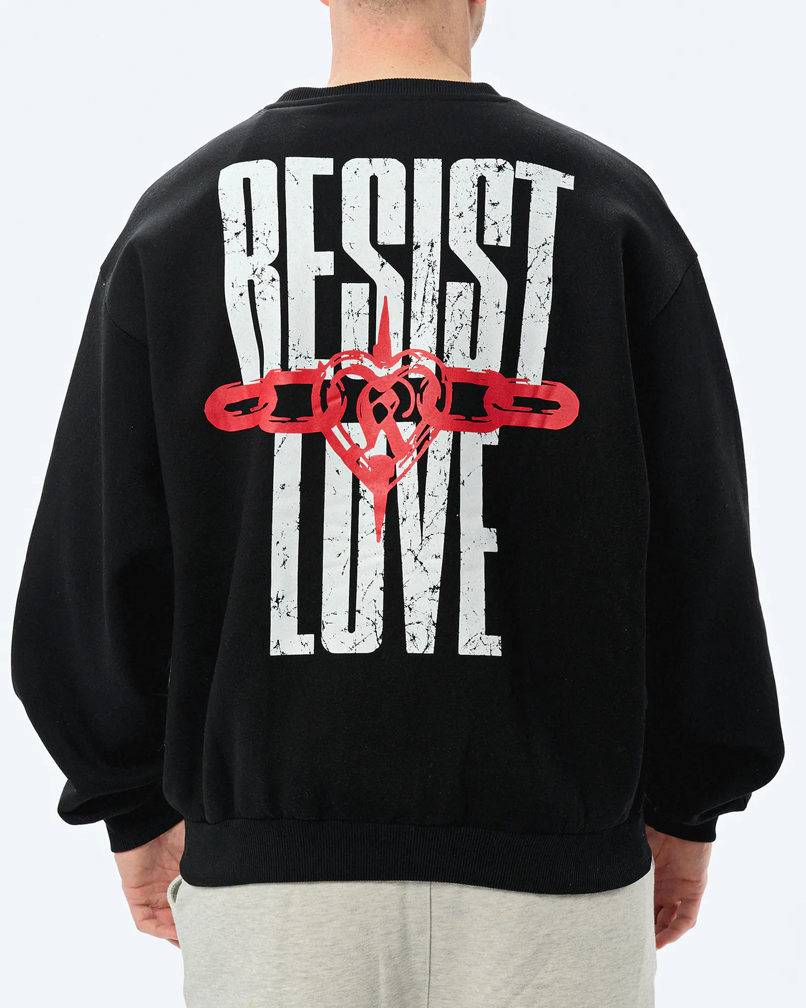 Karl Kani Woven Signature Resist Love Crewneck Black Karl Kani Woven Signature Resist Love Crewneck Black
