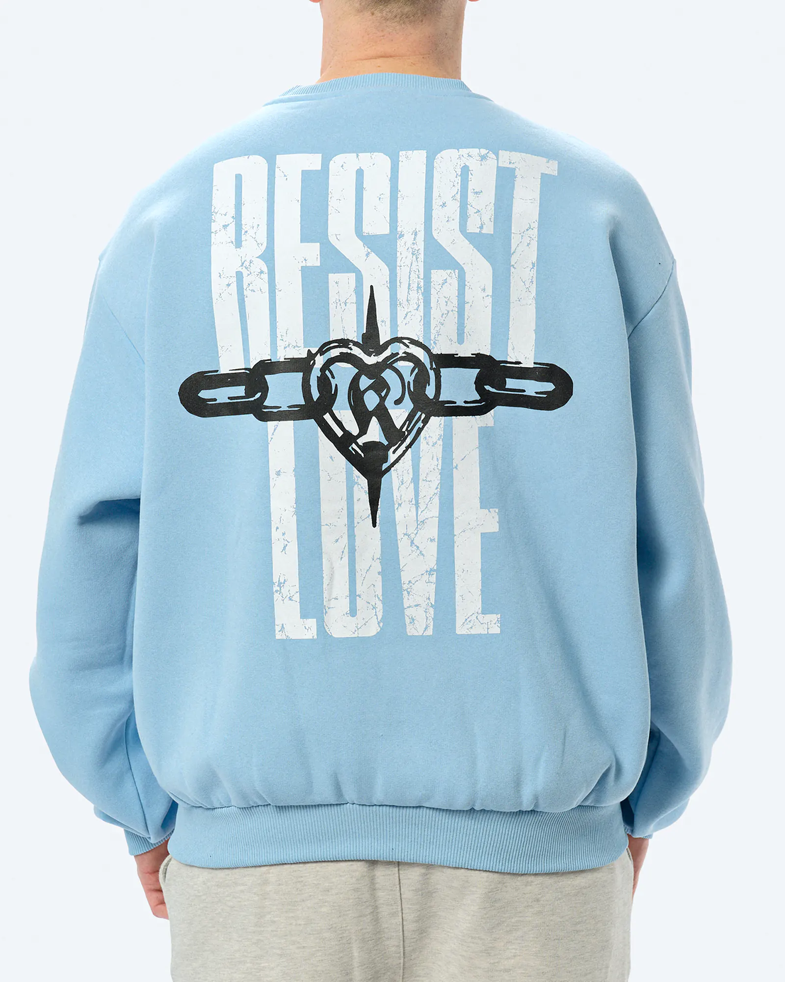 Karl Kani Woven Signature Resist Love Crewneck Light Blue Karl Kani Woven Signature Resist Love Crewneck Light Blue
