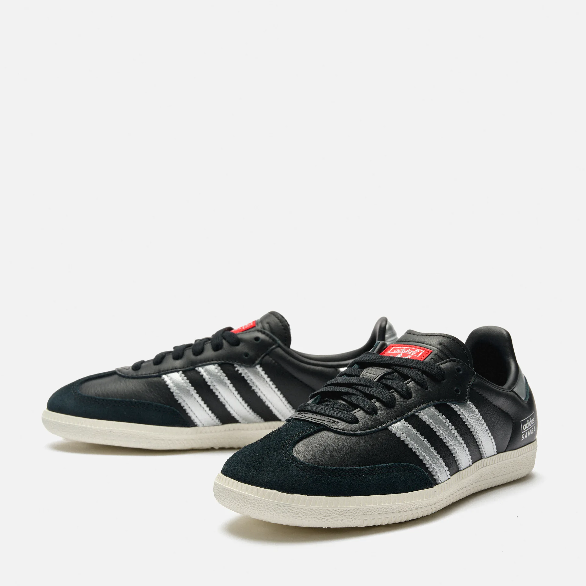 Black and silver tennis shoes hotsell