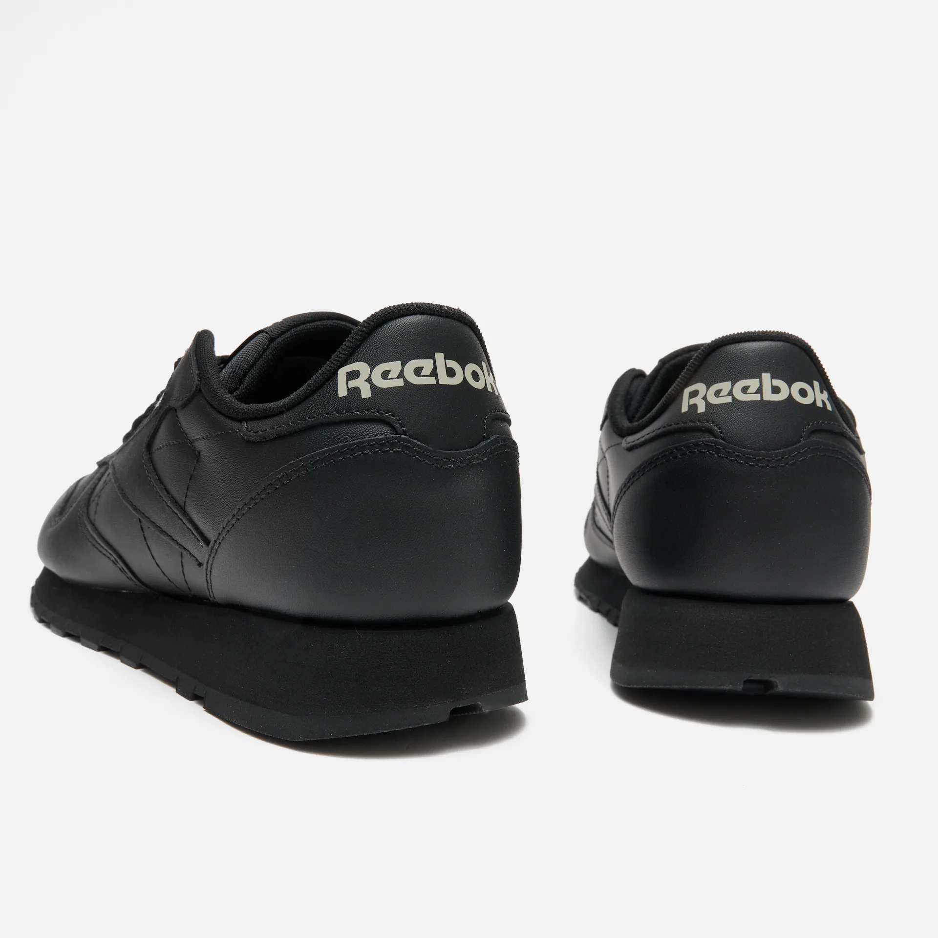 Black and white reebok trainers shop
