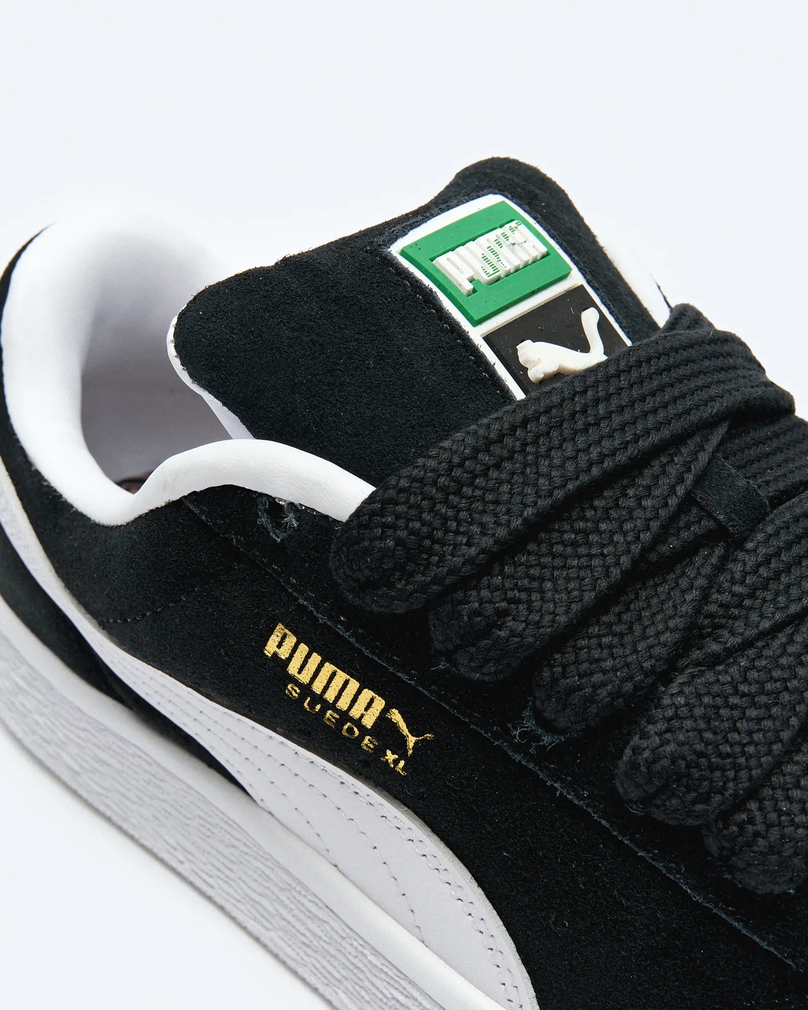 Black suede puma high tops shop