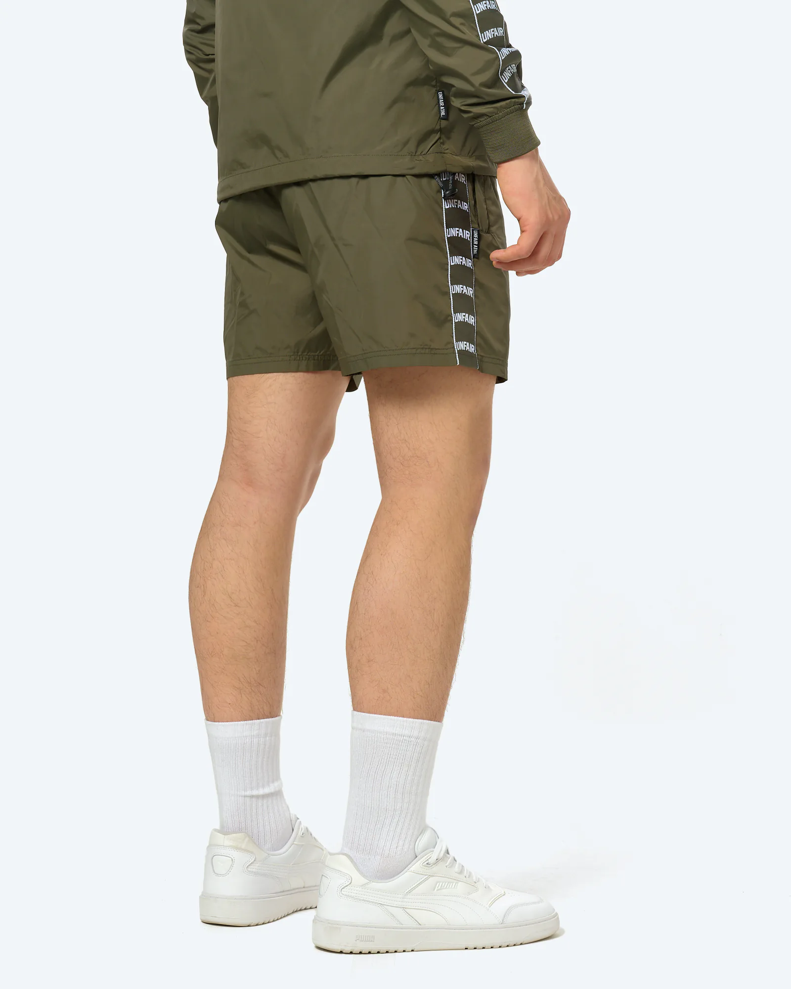 Unfair Athletics Curved Tape Trackshorts Olive