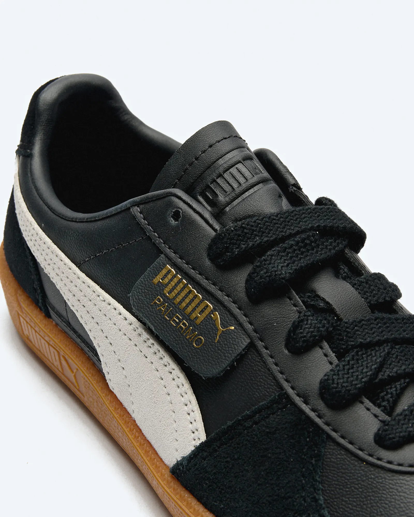 Black and grey puma shoes hotsell