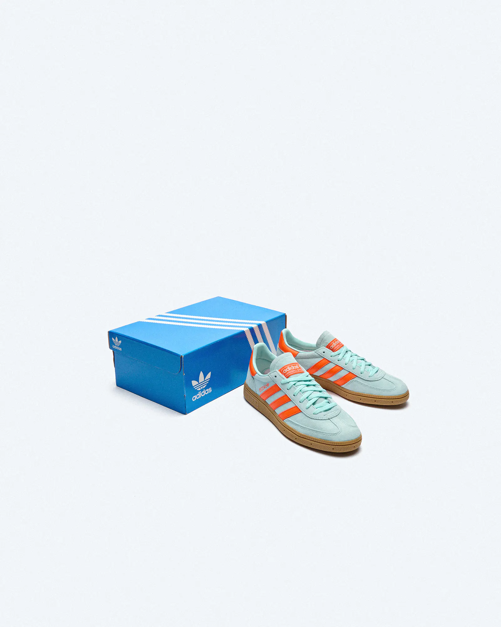 Blue and orange adidas sneakers sales