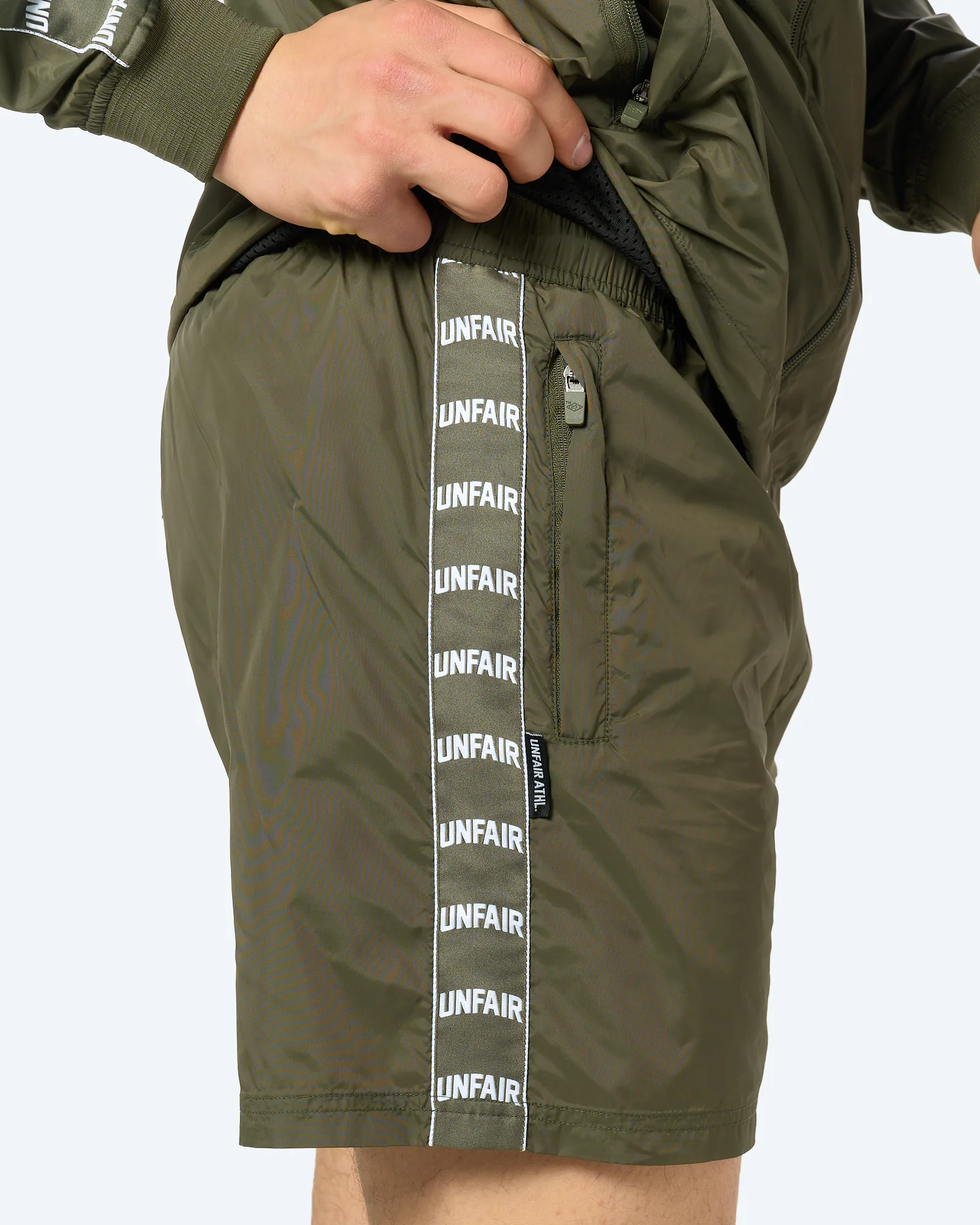 Unfair Athletics Curved Tape Trackshorts Olive